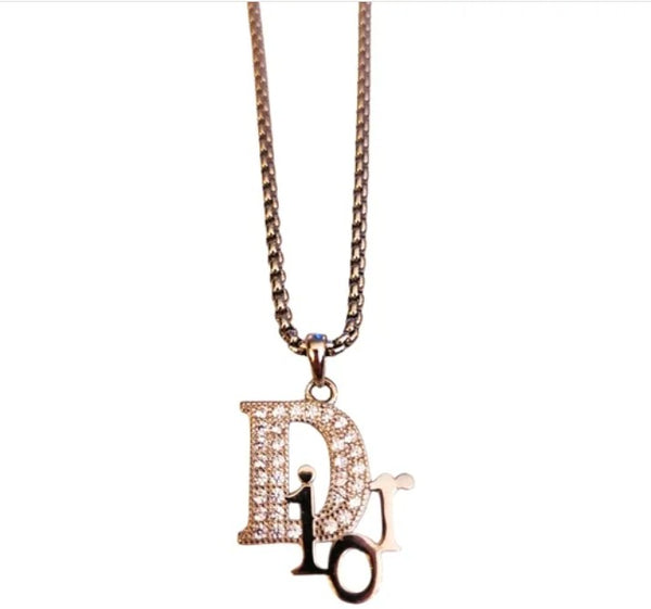 Silver Designer Logo Charm Repurposed on Stainless Steel Necklace Chain