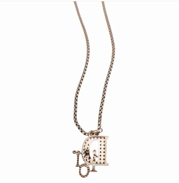 Silver Designer Logo Charm Repurposed on Stainless Steel Necklace Chain