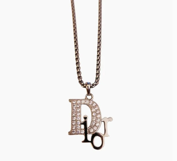 Silver Designer Logo Charm Repurposed on Stainless Steel Necklace Chain