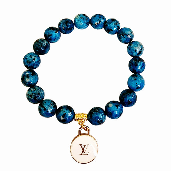 Repurposed LV Charm on Beaded Stretch Bracelet